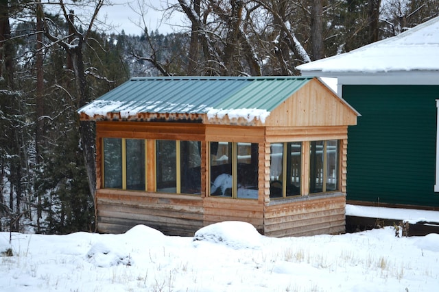 view of snow covered deck