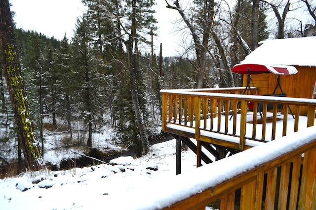 view of snow covered deck