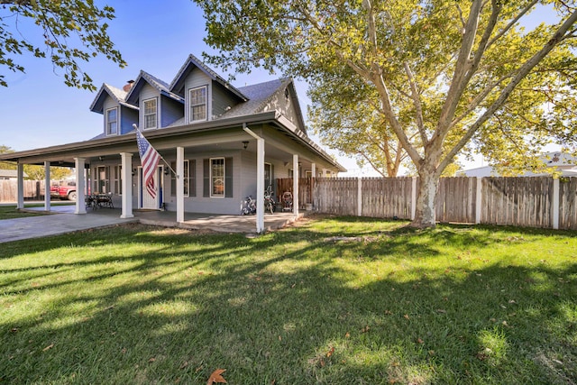 view of home's exterior featuring a yard and a patio