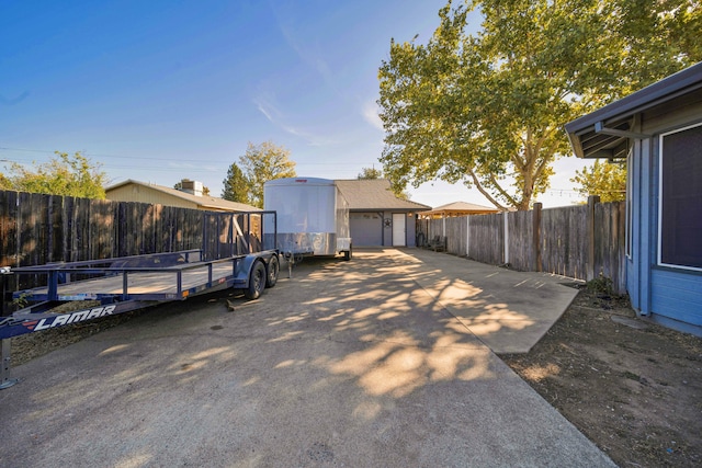 exterior space with an outbuilding and a garage