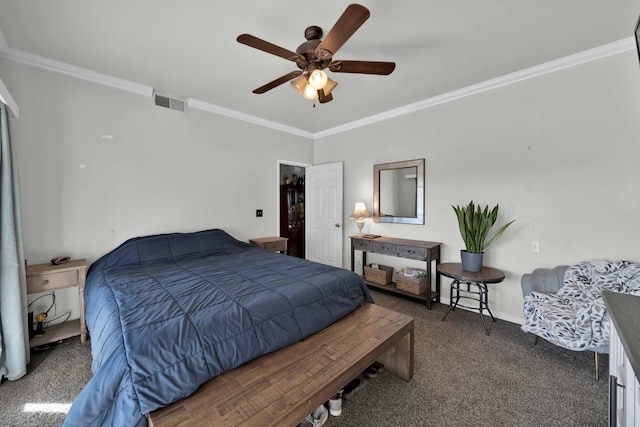 bedroom featuring ceiling fan, dark carpet, and crown molding