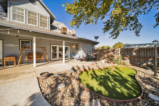 rear view of house featuring a patio