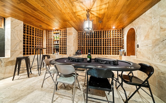 wine room featuring wooden ceiling