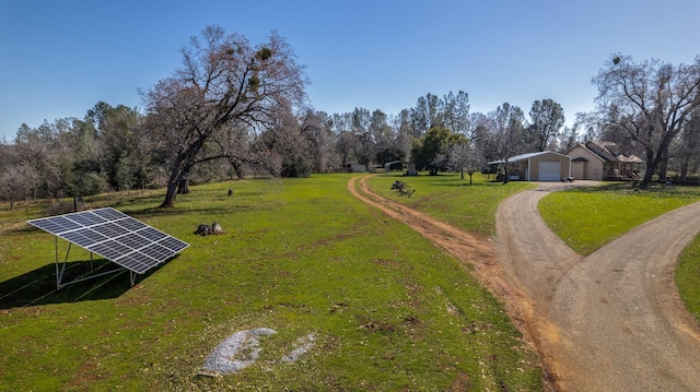 view of yard with a garage