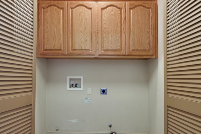 7899 Elmers Way, Shingletown, CA 96088 - clothes washing area featuring cabinet space, hookup for a washing machine, electric dryer hookup, hookup for a gas dryer, and baseboards