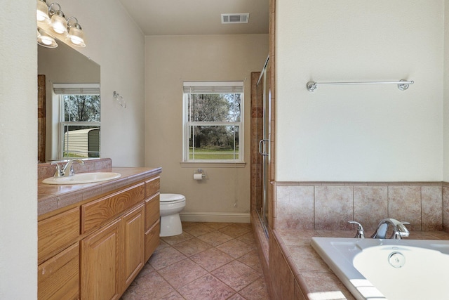 7899 Elmers Way, Shingletown, CA 96088 - full bath featuring healthy amount of natural light, vanity, toilet, and tile patterned floors