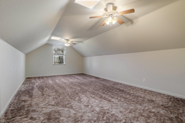 7899 Elmers Way, Shingletown, CA 96088 - bonus room with carpet, vaulted ceiling, baseboards, and a ceiling fan