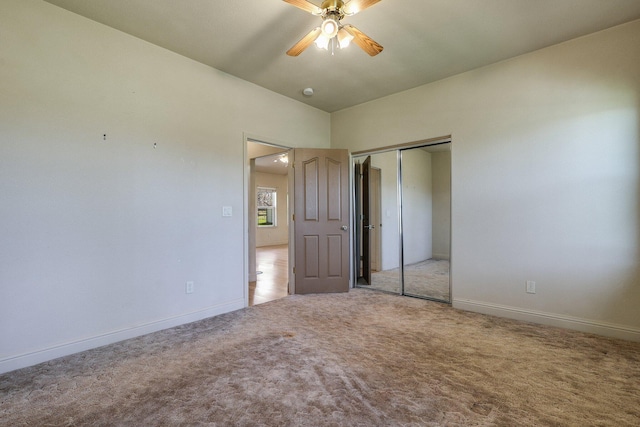 7899 Elmers Way, Shingletown, CA 96088 - unfurnished bedroom featuring carpet floors, baseboards, a closet, and a ceiling fan