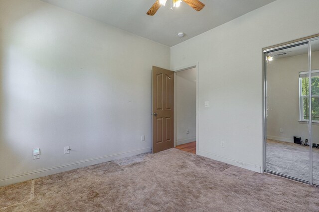7899 Elmers Way, Shingletown, CA 96088 - unfurnished bedroom with a closet, carpet floors, baseboards, and a ceiling fan