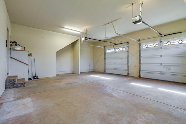 7899 Elmers Way, Shingletown, CA 96088 - garage featuring a garage door opener
