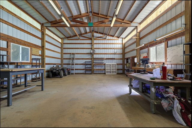 7899 Elmers Way, Shingletown, CA 96088 - garage with a workshop area and metal wall