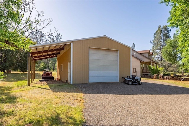 7899 Elmers Way, Shingletown, CA 96088 - garage featuring gravel driveway and a detached garage
