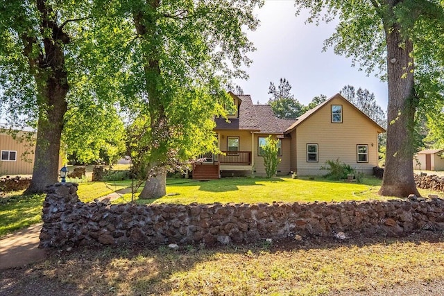 7899 Elmers Way, Shingletown, CA 96088 - back of property with a yard and a wooden deck