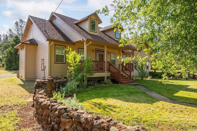7899 Elmers Way, Shingletown, CA 96088 - view of front of property featuring a porch, a front yard, and roof with shingles