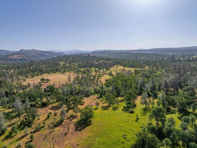 7899 Elmers Way, Shingletown, CA 96088 - aerial overview of property's location featuring a mountain backdrop and a forest