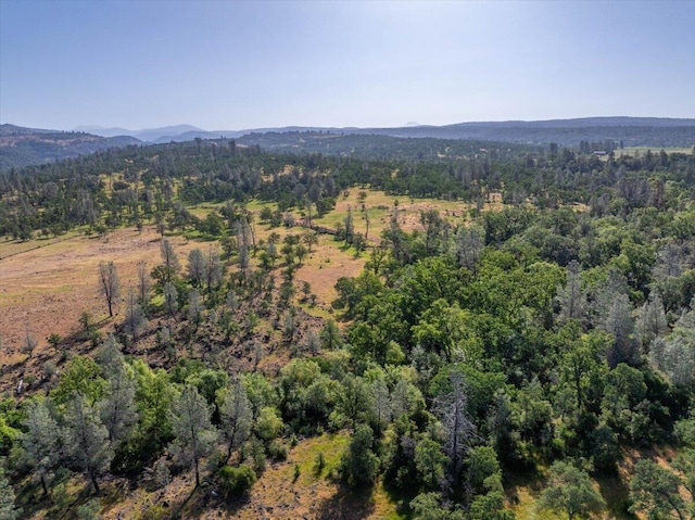 7899 Elmers Way, Shingletown, CA 96088 - aerial overview of property's location with a forest and mountains