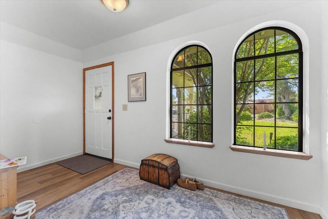 711 Teakwood Dr, Redding, CA 96003 - foyer entrance featuring wood finished floors and baseboards
