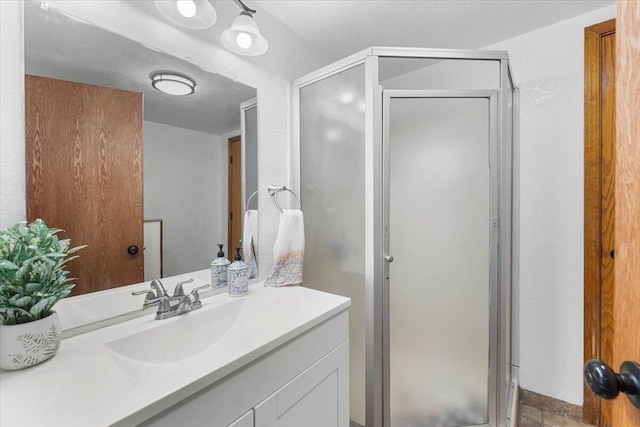 711 Teakwood Dr, Redding, CA 96003 - full bath featuring vanity and a shower stall