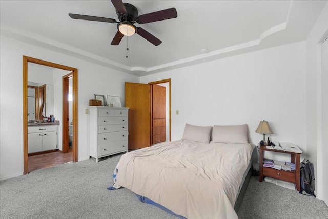 711 Teakwood Dr, Redding, CA 96003 - bedroom featuring carpet floors, ensuite bathroom, a raised ceiling, and a ceiling fan