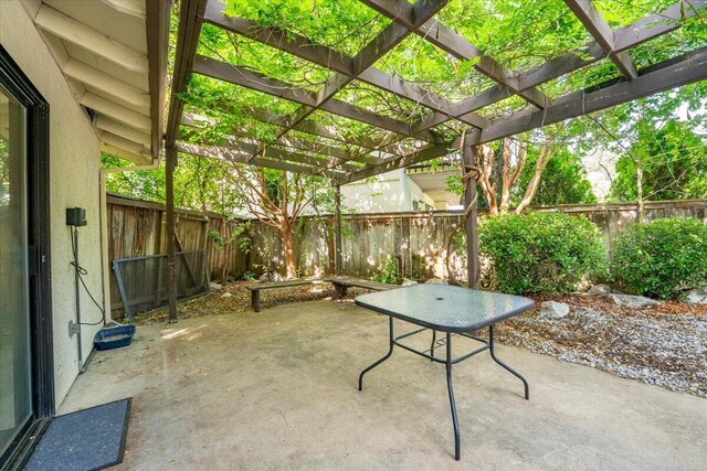 711 Teakwood Dr, Redding, CA 96003 - fenced backyard with a patio and a pergola