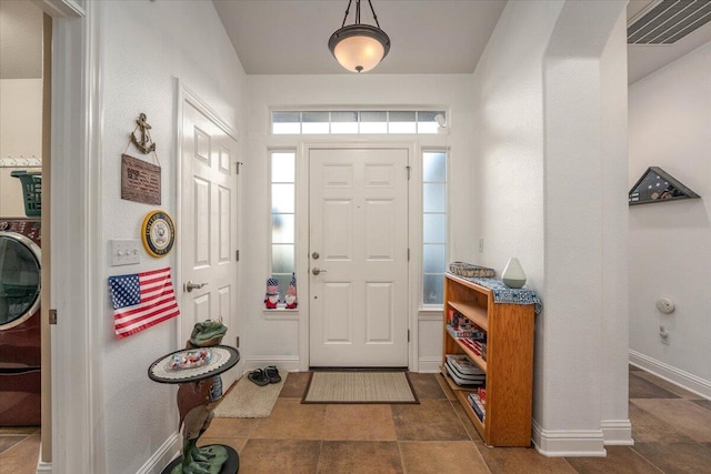 entrance foyer featuring washer / clothes dryer