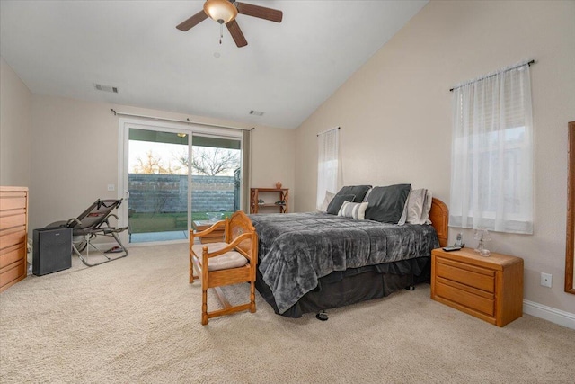 bedroom with ceiling fan, light colored carpet, and lofted ceiling