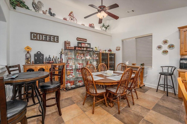 dining room with ceiling fan