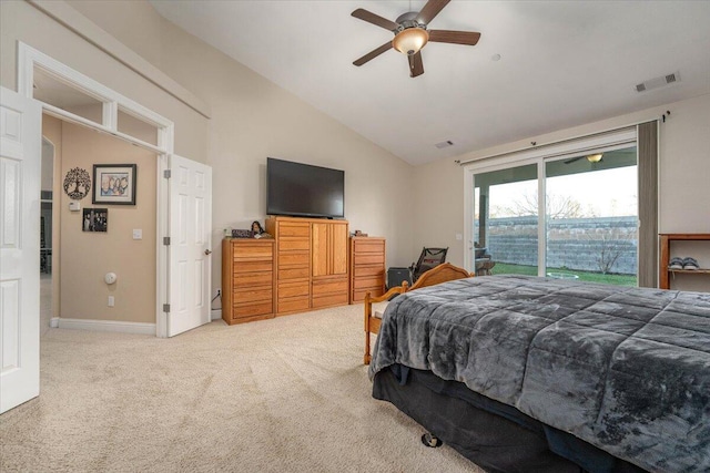 carpeted bedroom featuring ceiling fan and lofted ceiling