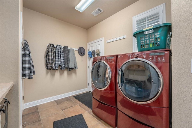 laundry room featuring washing machine and dryer