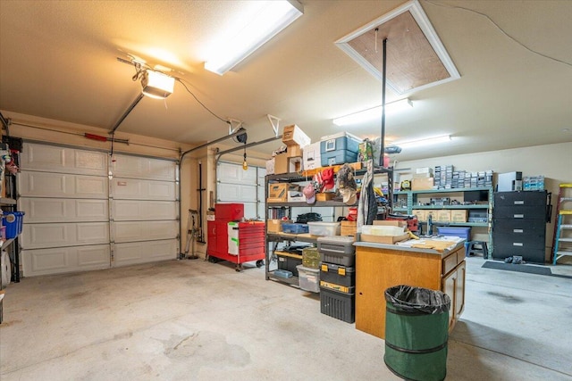 garage featuring a garage door opener