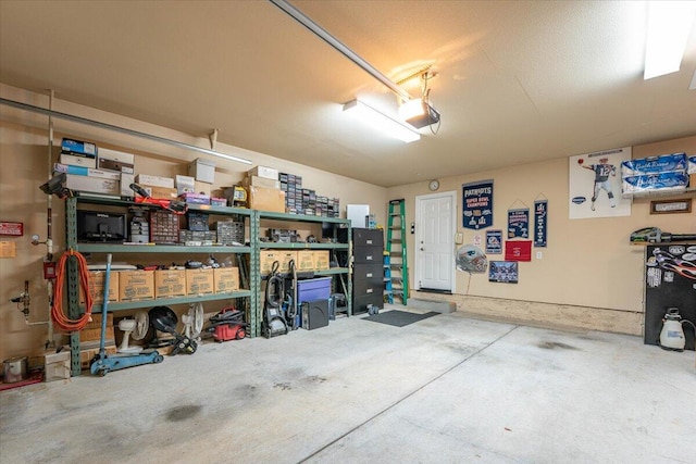 garage featuring a garage door opener