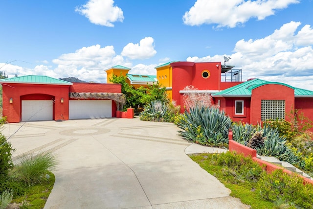 view of front of home with a garage