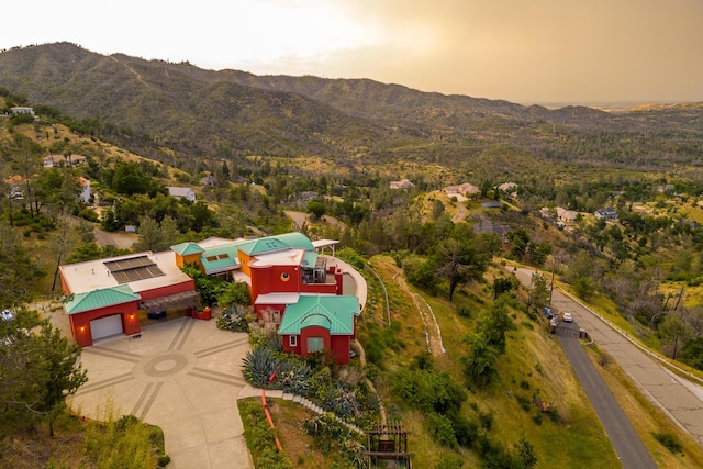 aerial view at dusk with a mountain view