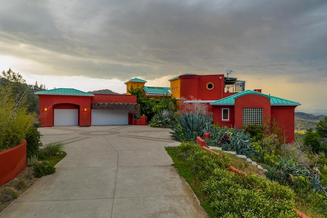 view of front of property with a garage