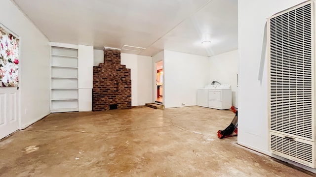 basement with independent washer and dryer and built in shelves