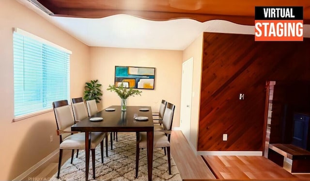 dining room featuring wood-type flooring