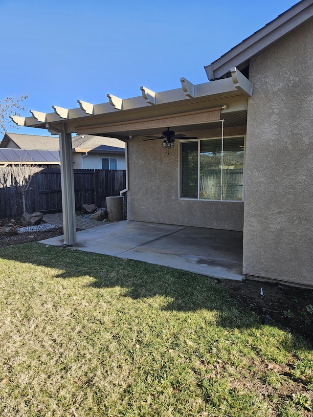 exterior space with a lawn and a patio