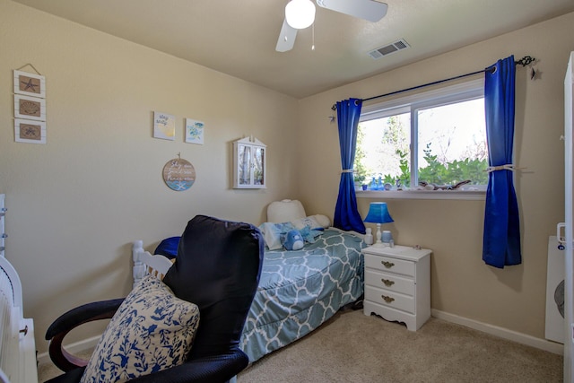 carpeted bedroom with ceiling fan