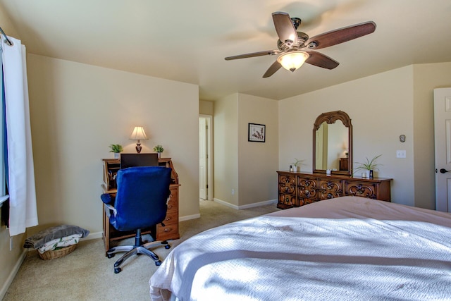 bedroom with light carpet and ceiling fan