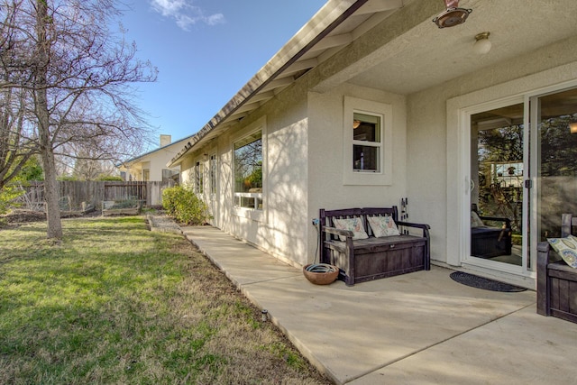 exterior space featuring a patio and a yard