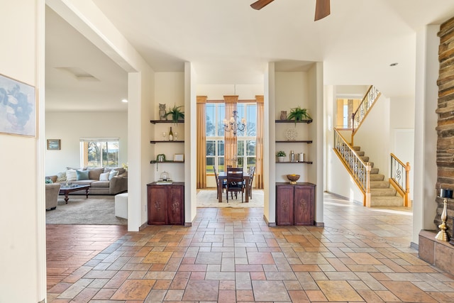 foyer featuring ceiling fan