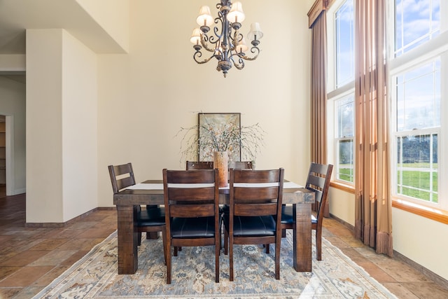 dining room featuring a notable chandelier