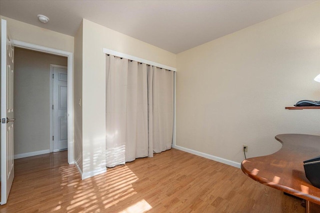 unfurnished bedroom with light hardwood / wood-style flooring