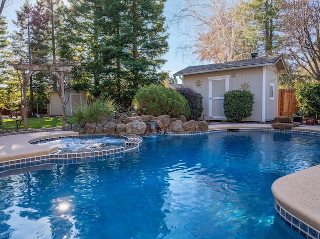 view of pool featuring an in ground hot tub and a storage shed