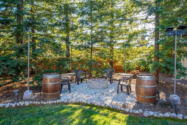 view of patio / terrace featuring a fire pit