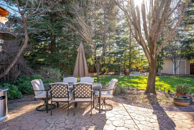 view of patio / terrace featuring a storage unit