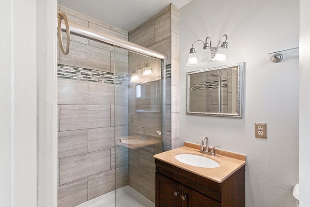 bathroom with vanity and walk in shower