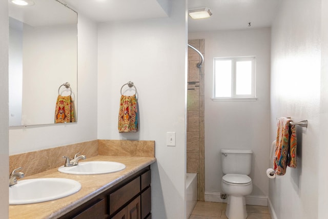 full bathroom featuring tile patterned floors, vanity, toilet, and shower / bathtub combination