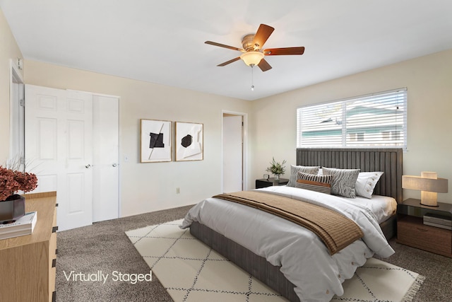 carpeted bedroom with ceiling fan