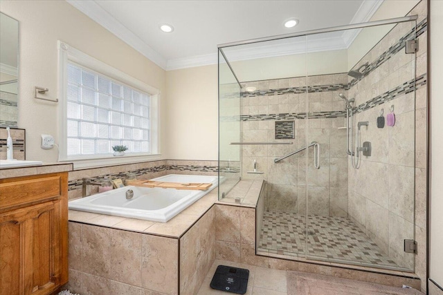 bathroom with tile patterned floors, vanity, ornamental molding, and separate shower and tub